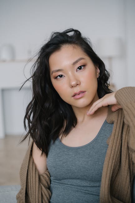 Person using a tablet with data charts and graphs